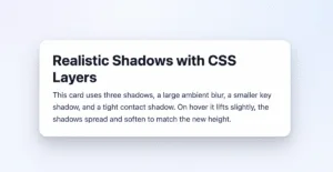 White card on a soft gradient background with layered ambient, key, and contact shadows.