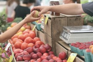 Customer buying apple.