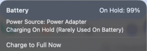 Image showing "Charging on hold" message in MacBook.