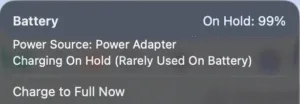 Image showing "Charging on hold" message in MacBook.