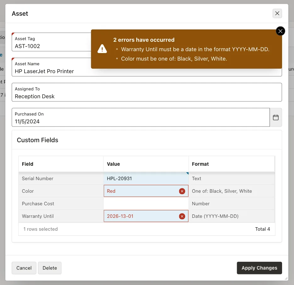 Asset dialog with two errors: Warranty Until must be a date in the format YYYY-MM-DD and Color must be one of Black, Silver, White; both cells marked in red